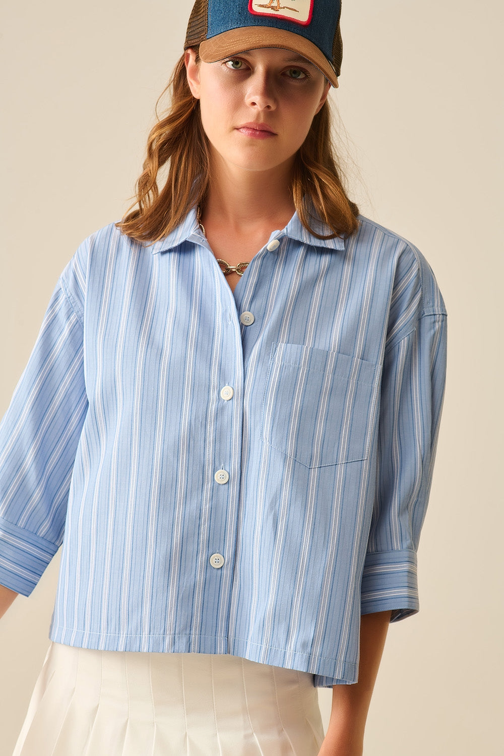 Camisa cropped às riscas de corte relaxado em azul