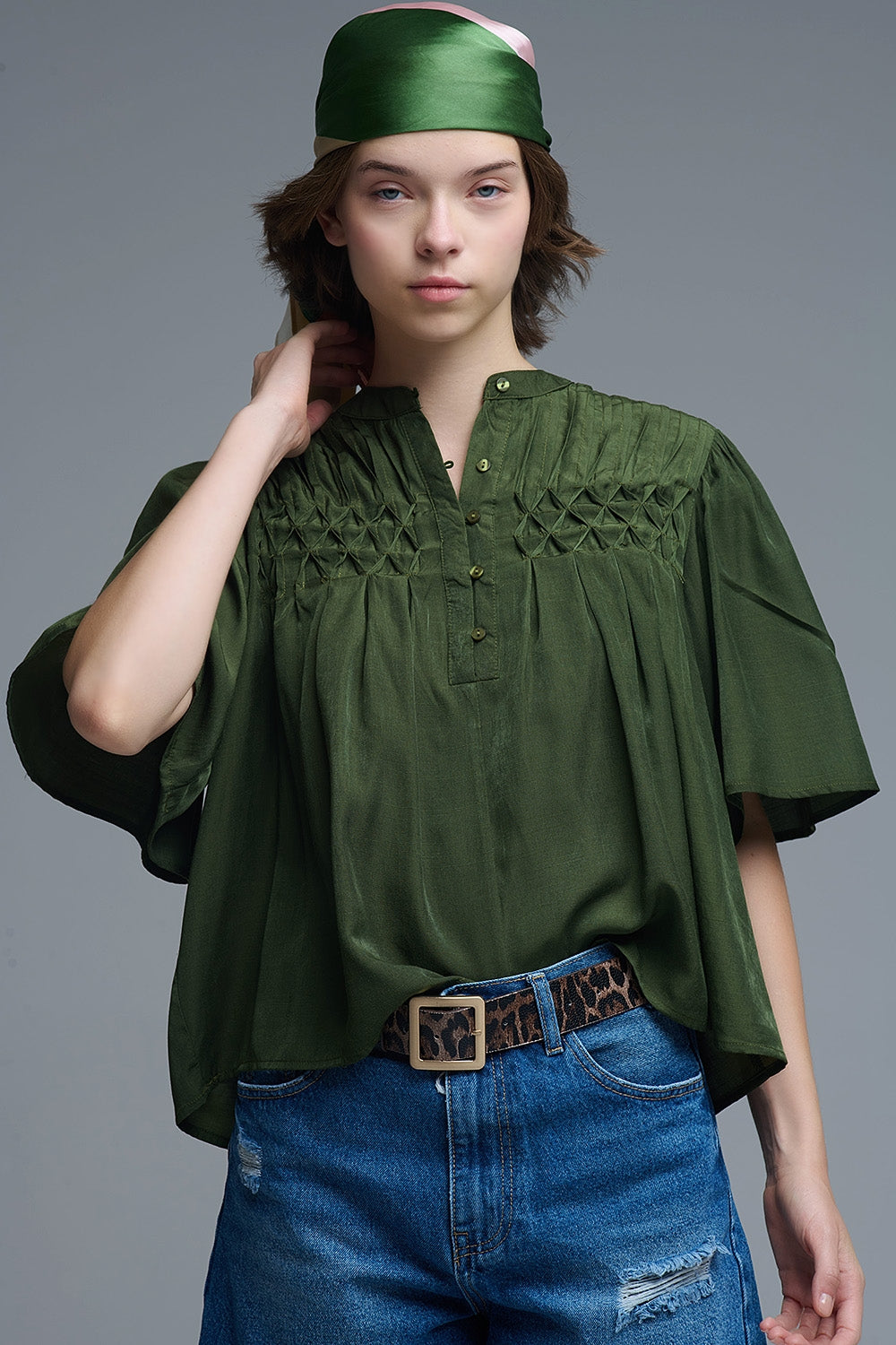 Relaxed Green boho-style blouse with embroidered details
