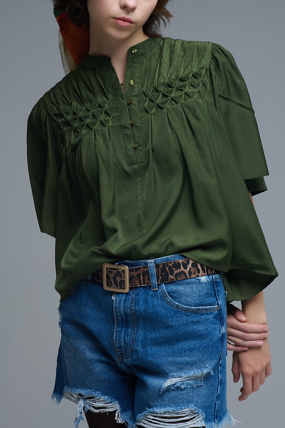 Relaxed Green boho-style blouse with embroidered details