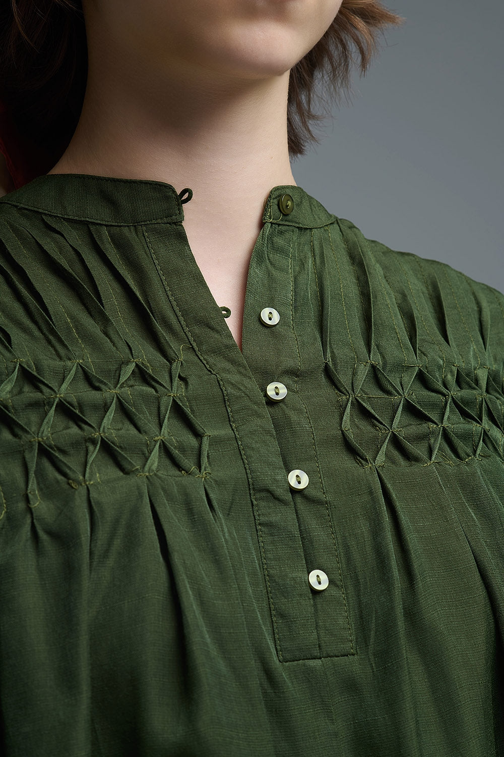Relaxed Green boho-style blouse with embroidered details