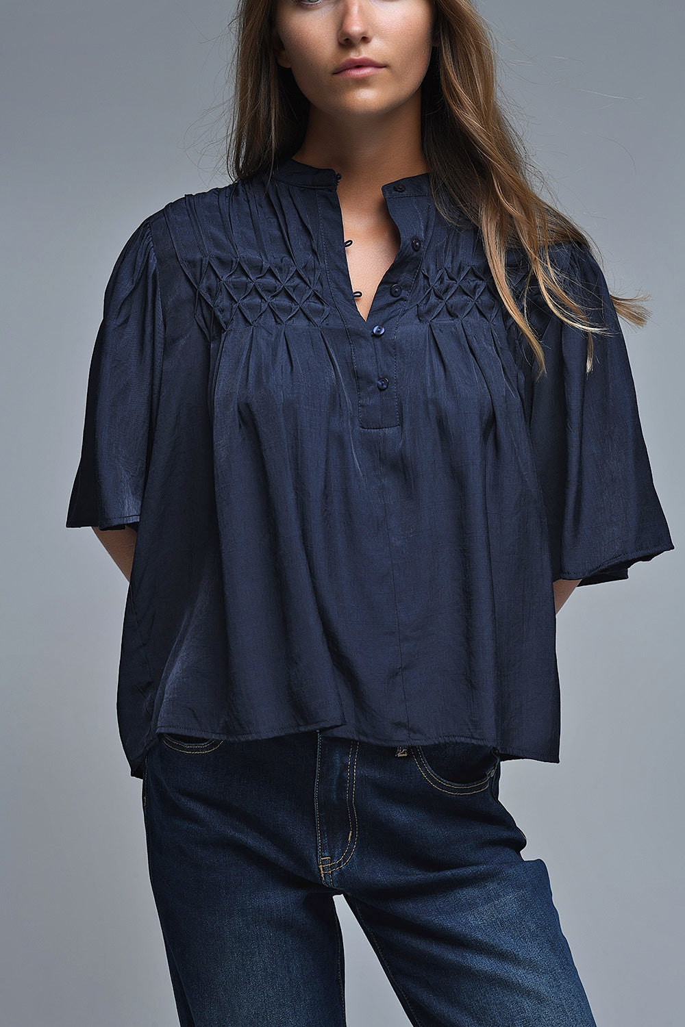 Relaxed Navy boho-style blouse with embroidered details