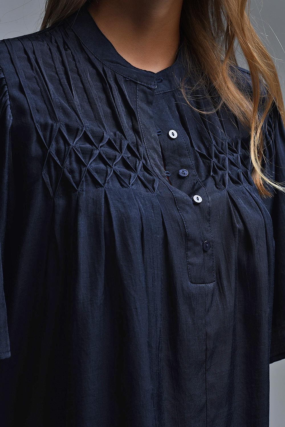 Relaxed Navy boho-style blouse with embroidered details