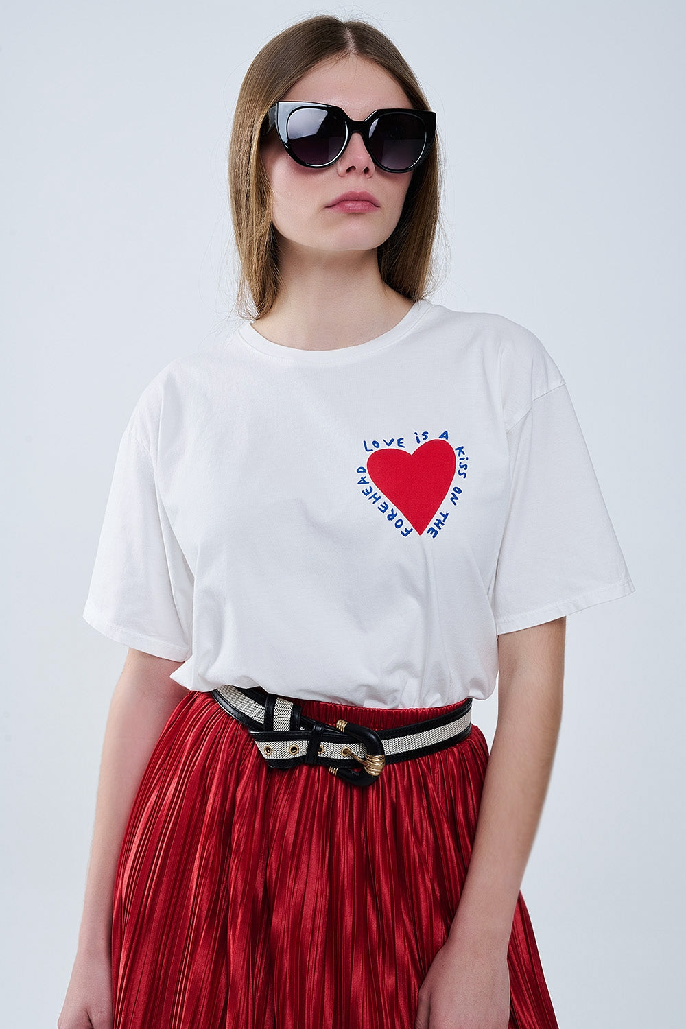 Relaxed white T-shirt featuring a heart design on both the front and back