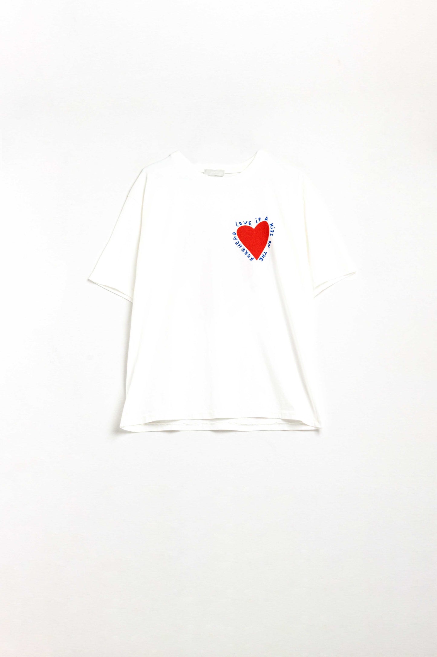 Relaxed white T-shirt featuring a heart design on both the front and back