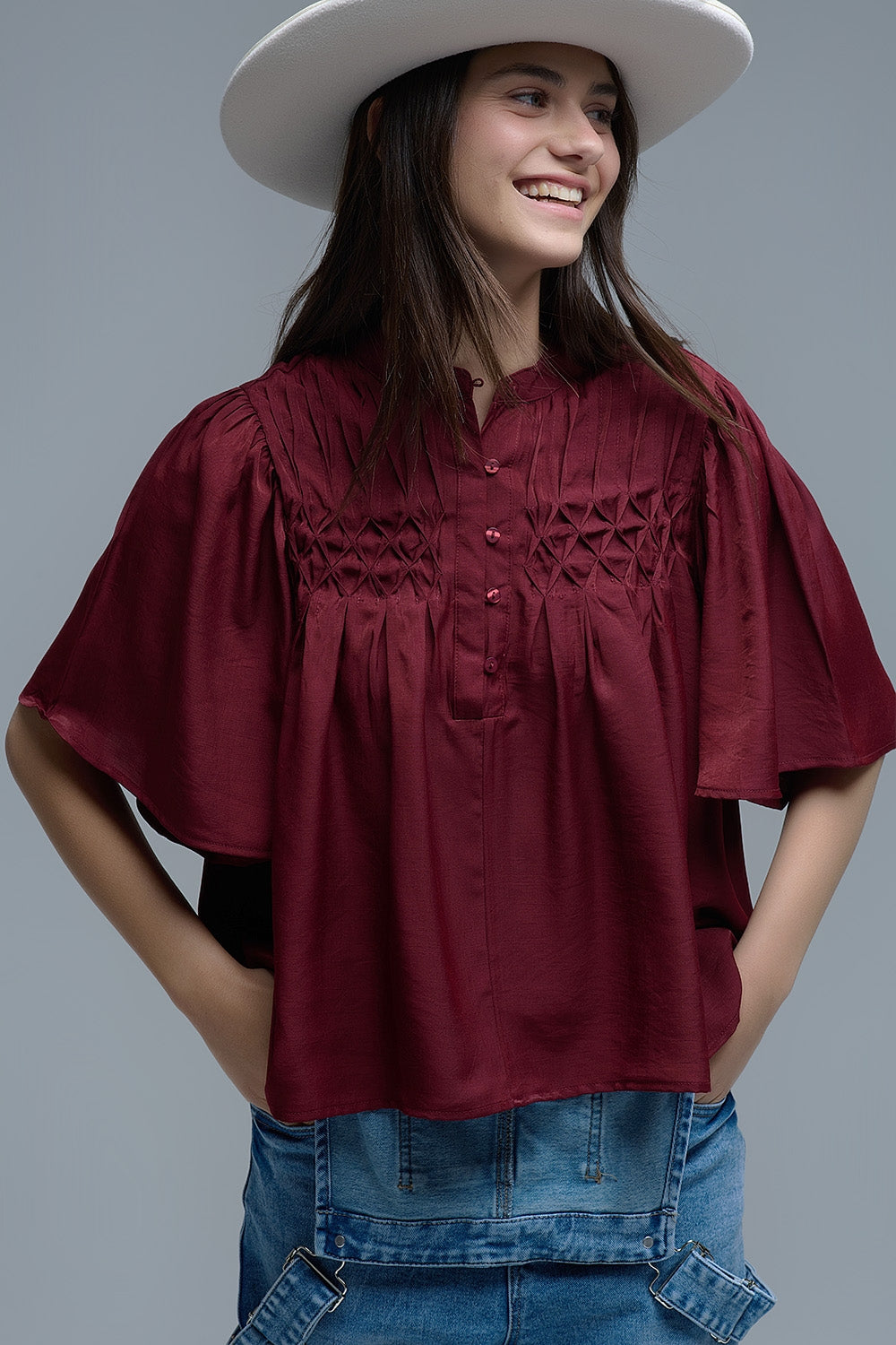 Q2 Relaxed wine-colored boho-style blouse with embroidered details