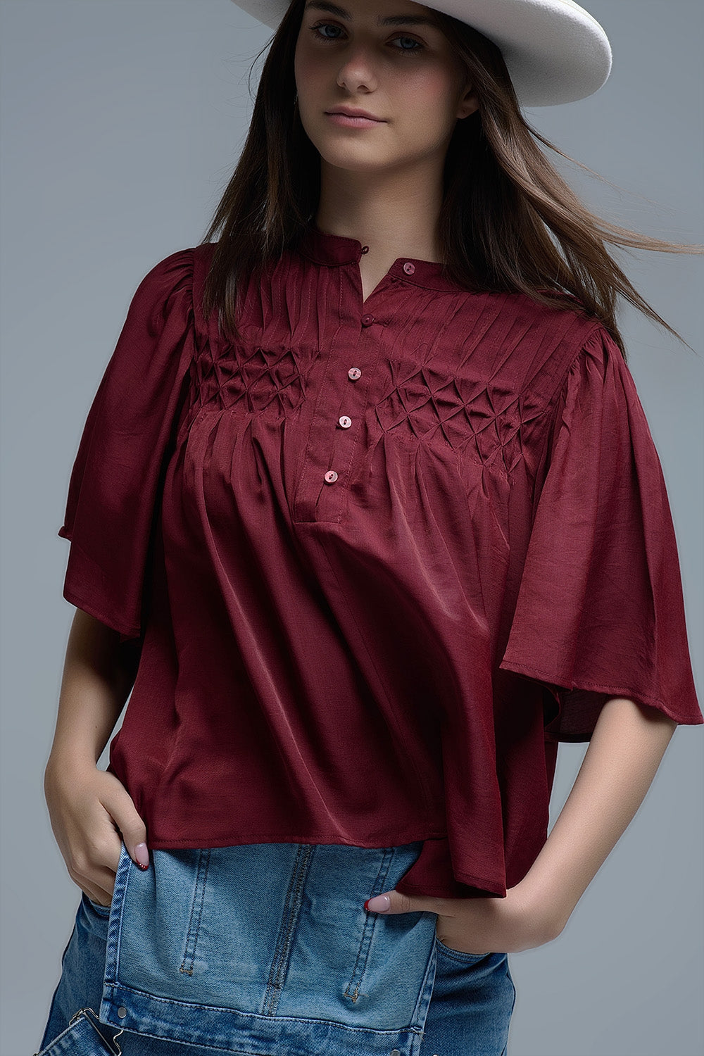 Relaxed wine-colored boho-style blouse with embroidered details