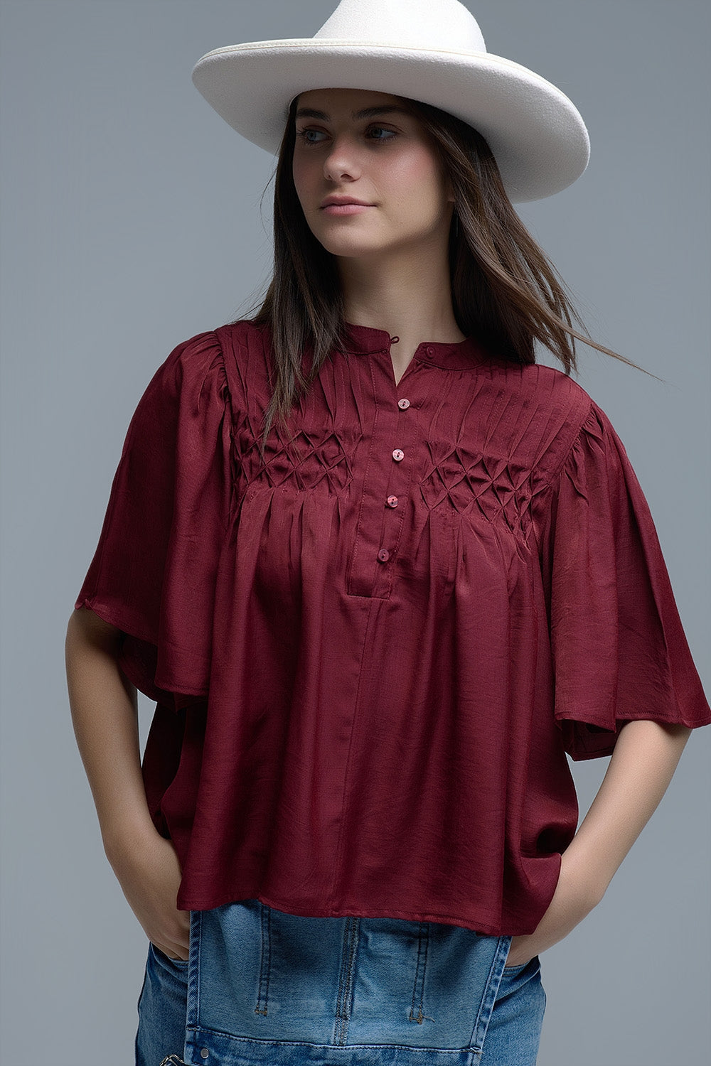 Relaxed wine-colored boho-style blouse with embroidered details