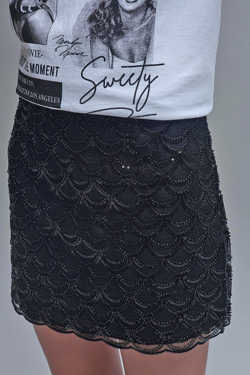 Scalloped Sequin Mini Skirt in Black