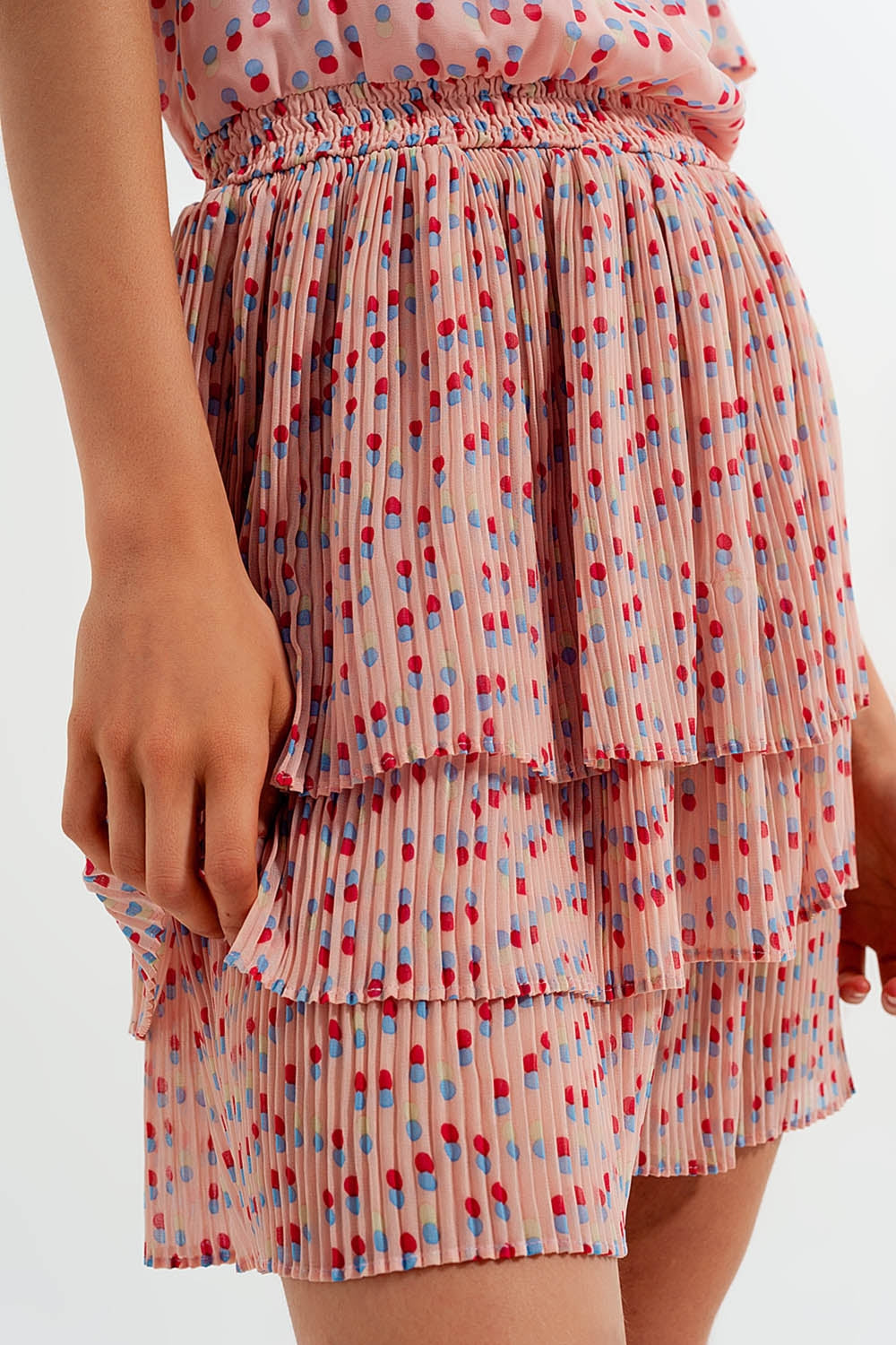 Geplooide mini-jurk met peplum in roze