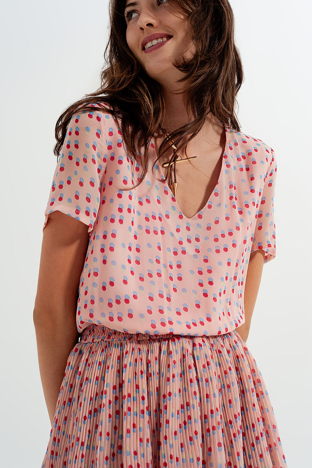 Geplooide mini-jurk met peplum in roze