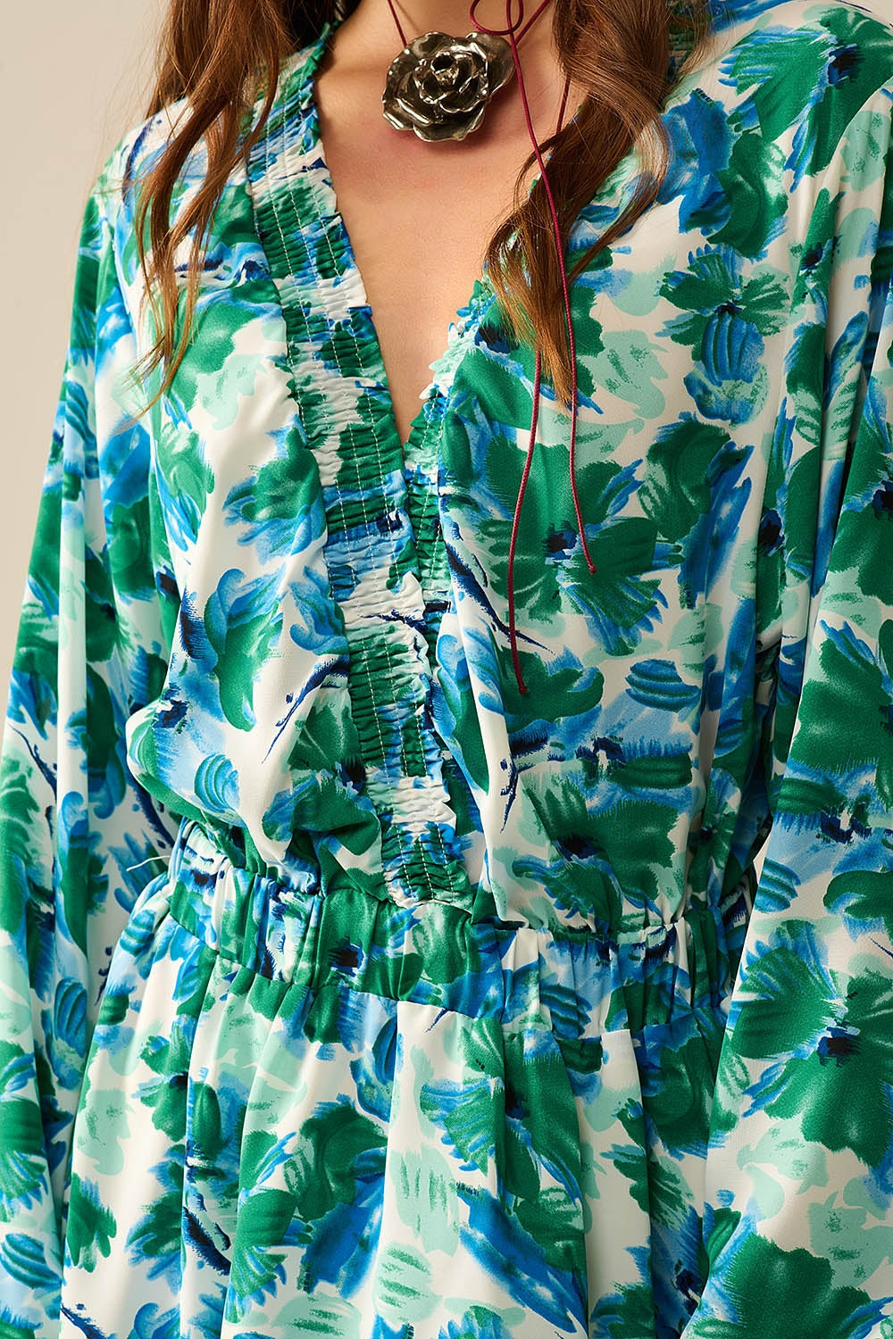 short dress with a wide V-neck and floral print