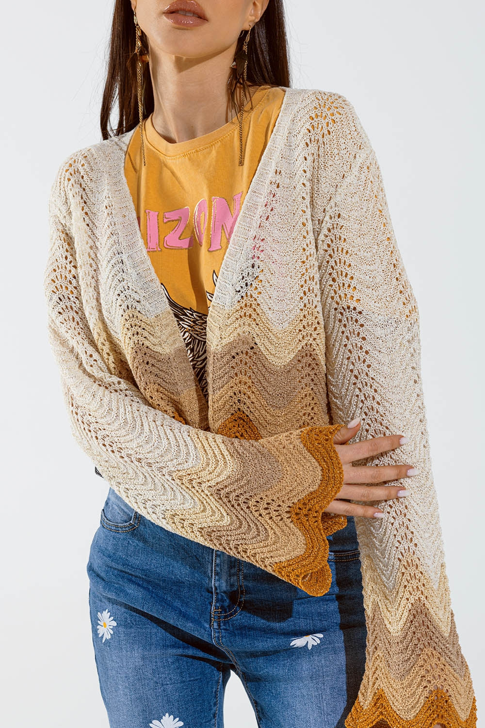 Short knitted cardigan with angel sleeves and wave multicolor detail in beige