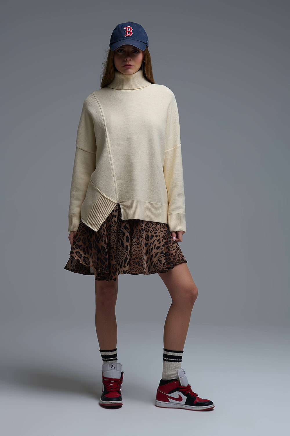 Soft knitted Asymmetric Turtleneck Sweater in beige