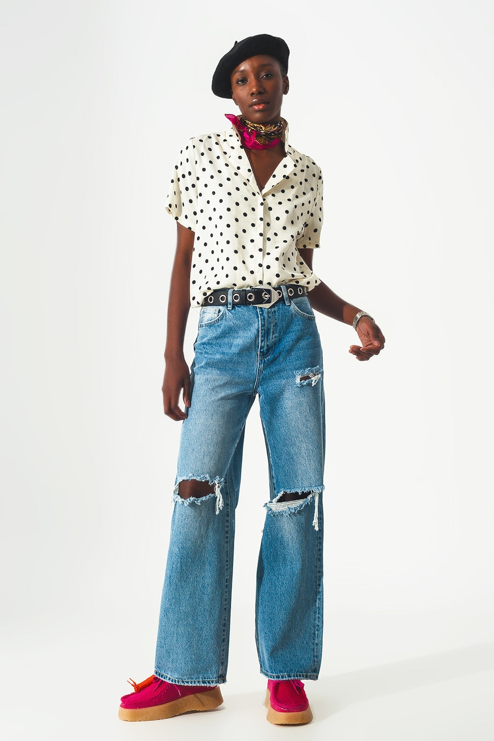 Straight jean in medium wash with rip and split hem