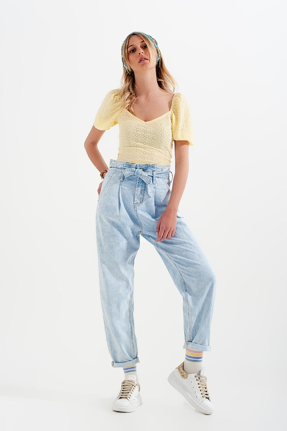 Tapered leg jeans with paper bag waist in light vintage wash