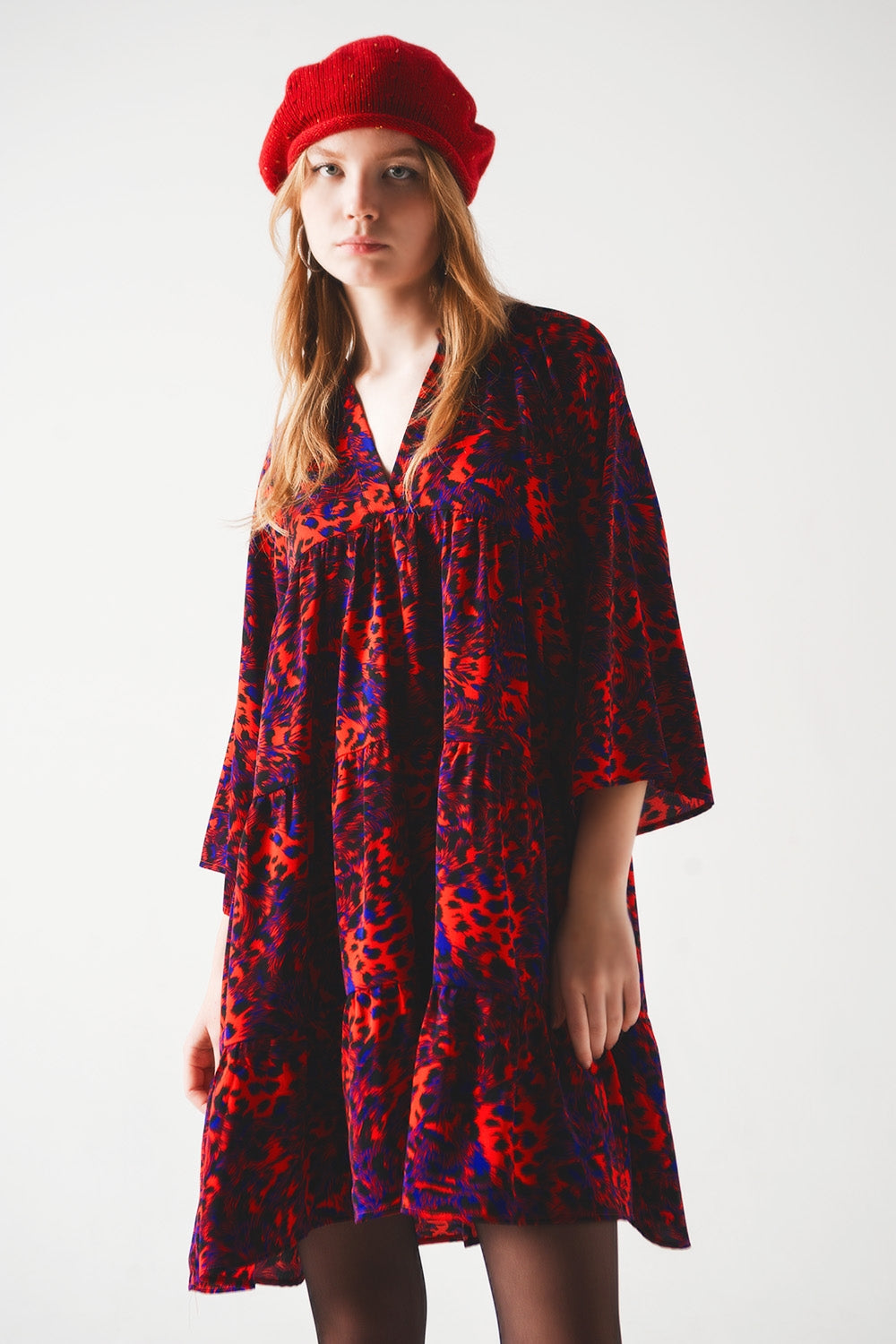 Tiered mini smock dress in animal print in red