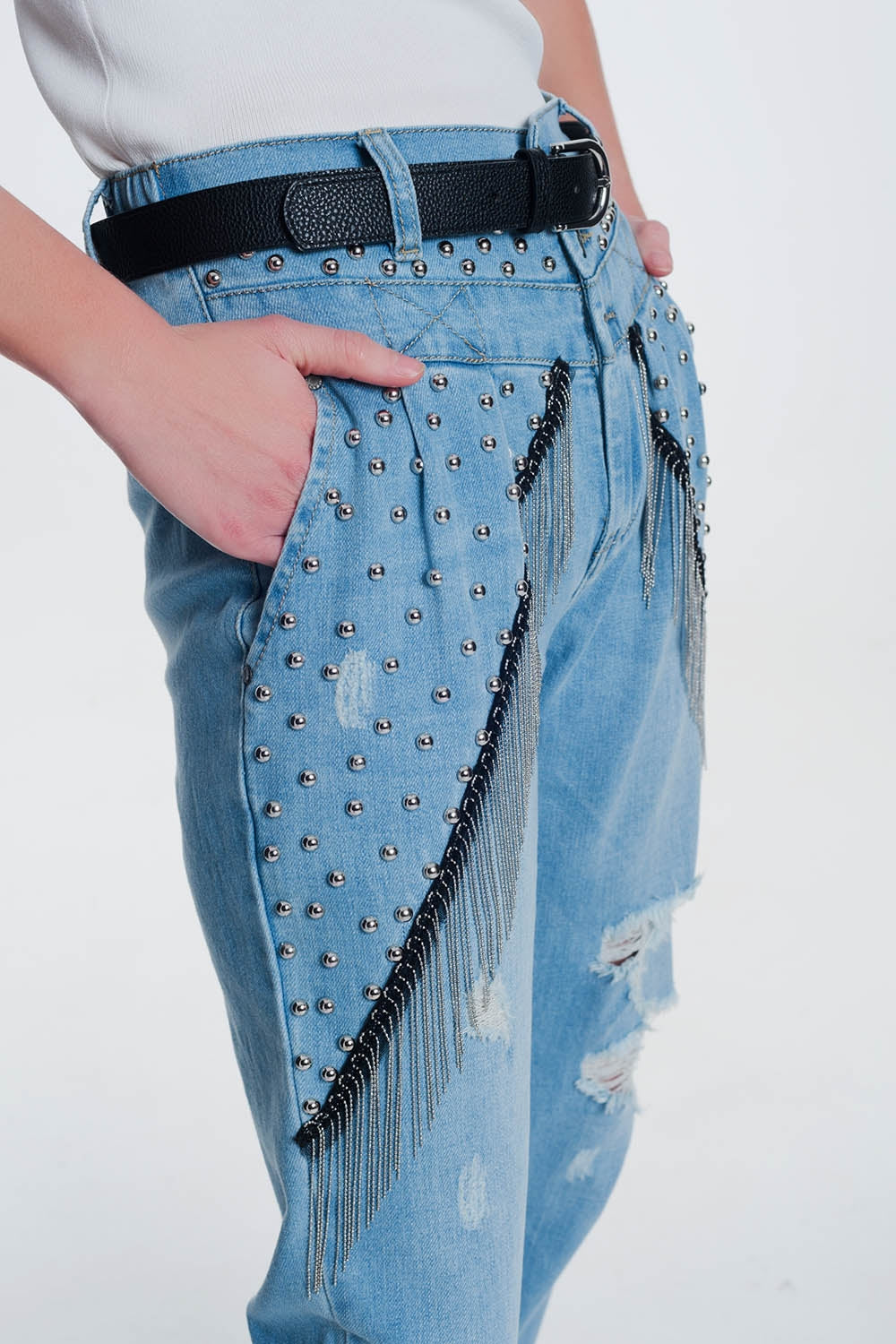 vintage ripped straight jeans with studs and chains