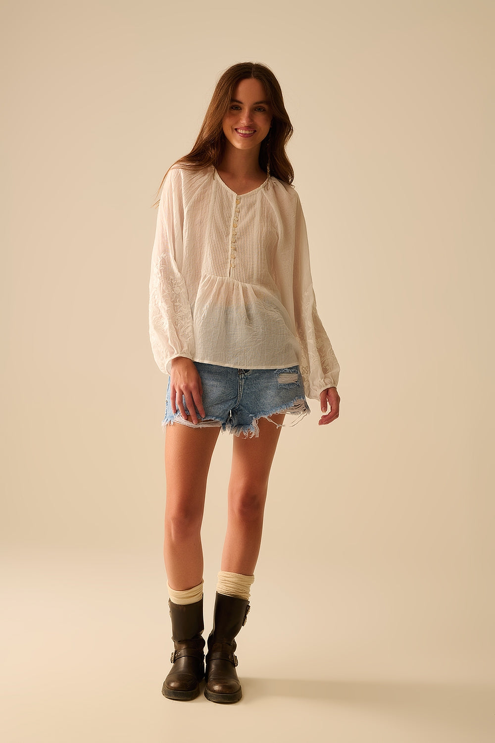 white chiffon blouse with embroidery on the sleeves