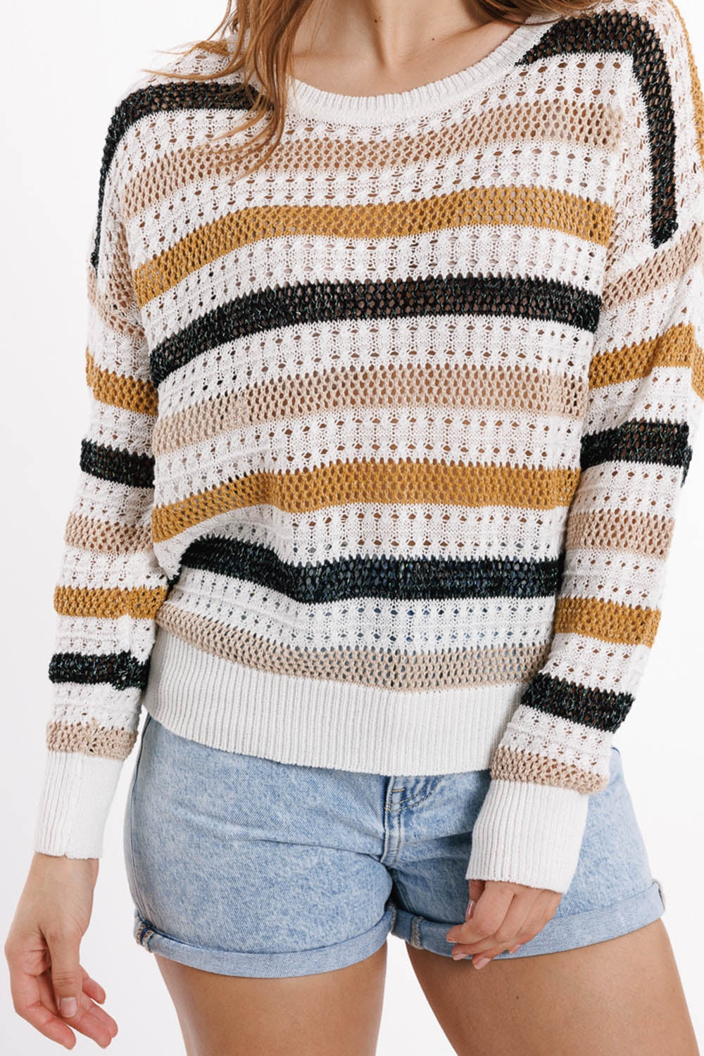 White knit sweater with multicolored stripes