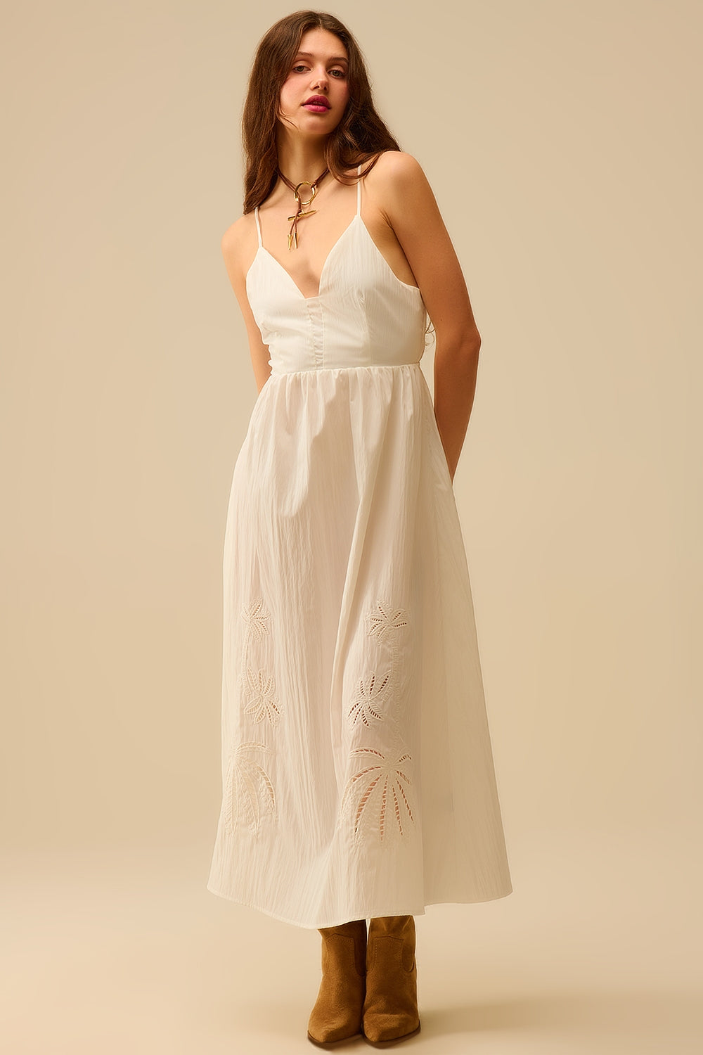 White maxi dress with embroidered palms