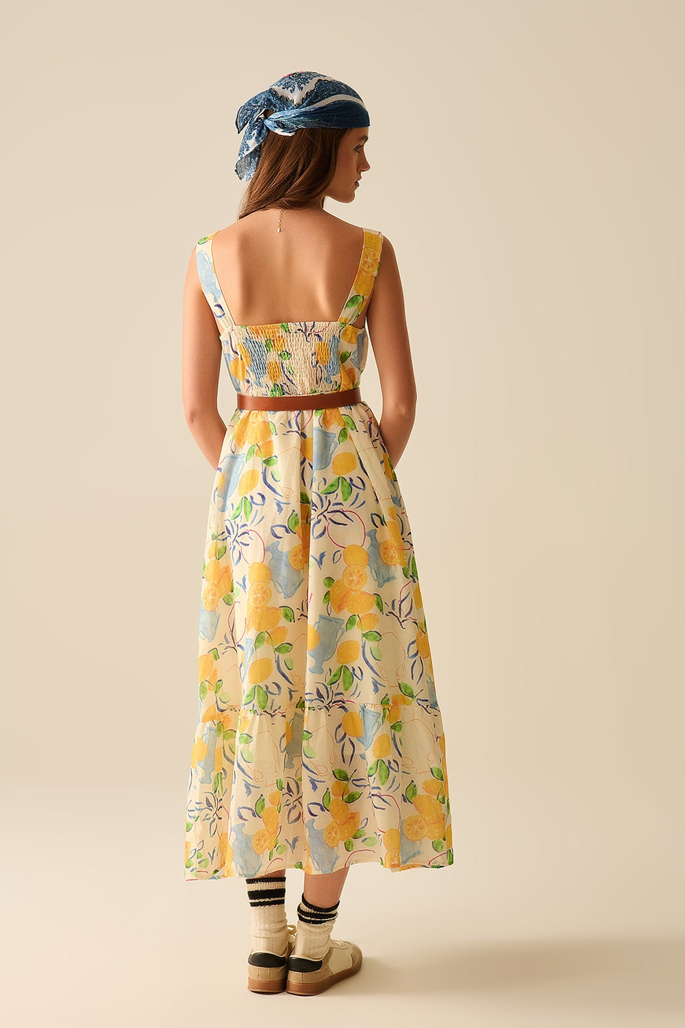 white maxi strapless dress with lemon print