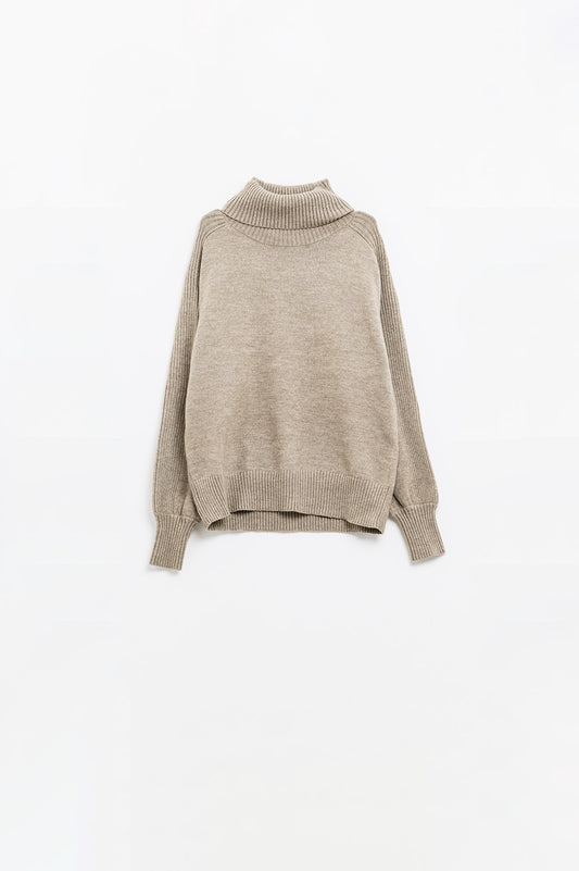 wide beige sweater with ribbed sleeves