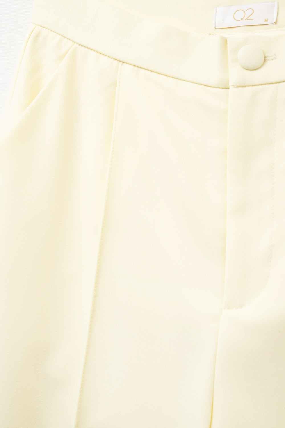 Calças de alfaiataria de perna larga em amarelo