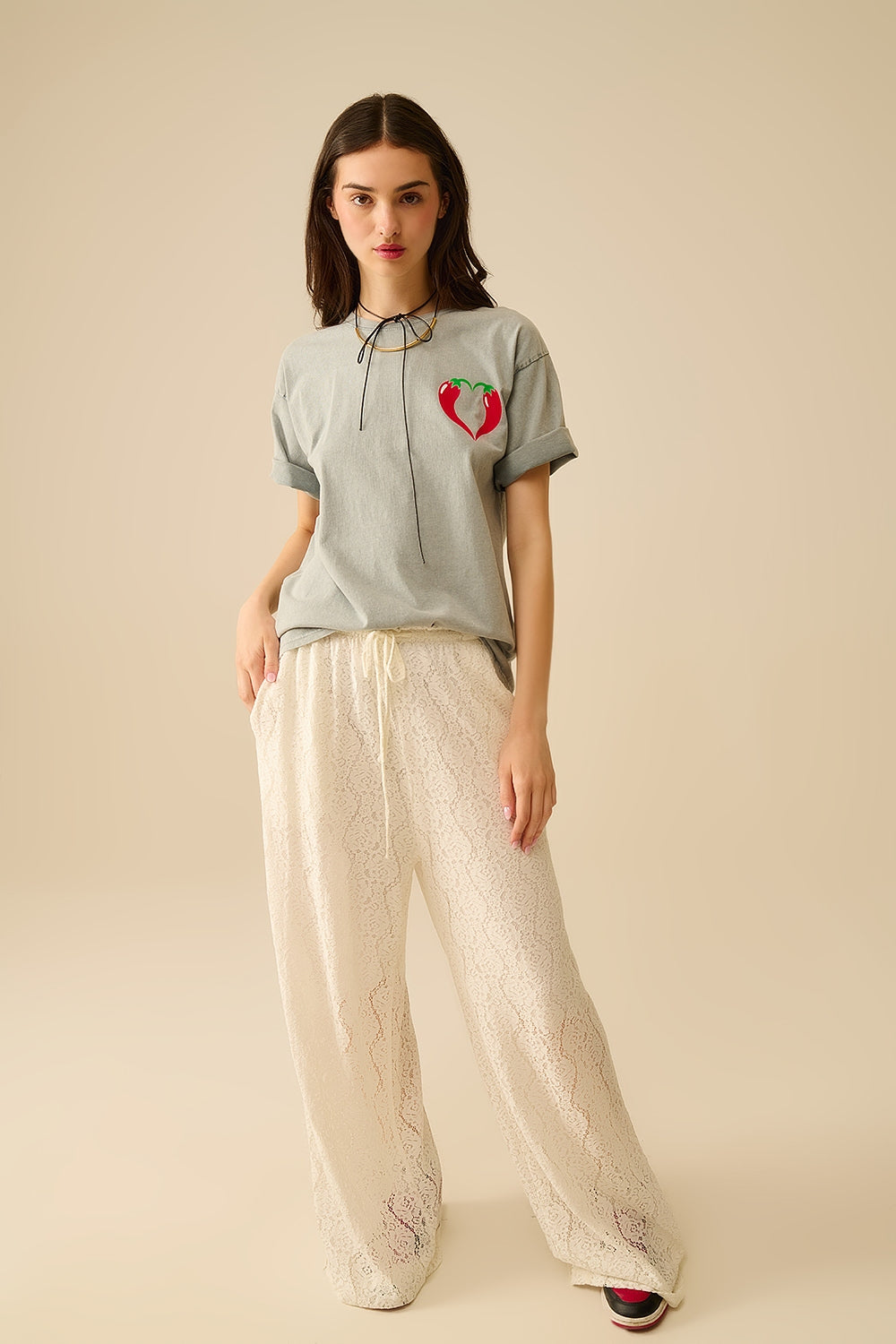 wide-legged lace pants with elastic waistband