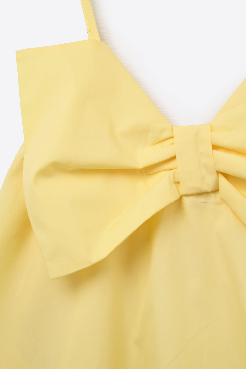 Yellow poplin mini dress with a big bow detail